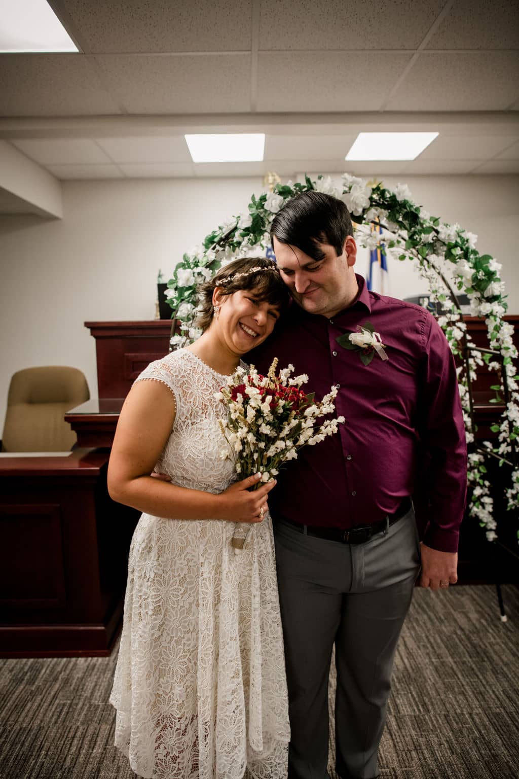 the texas bride and groom elope at the brazos county courthouse in front of the justice