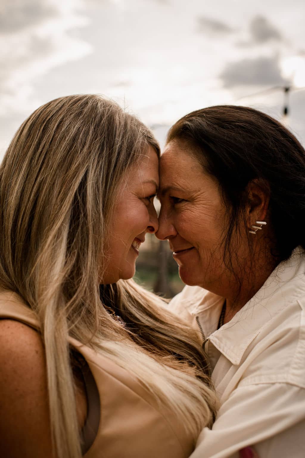 two brides foreheads touching in a bryan-college station wedding venue in an inclusive client experience