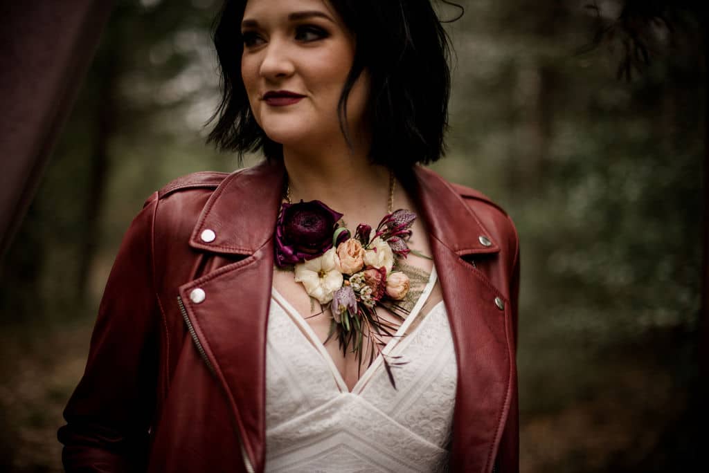 the brides floral necklace is designed by texas wedding florist Urban Rubbish