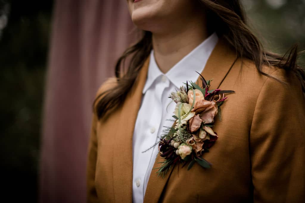 the bride's floral boutonniere designed by texas wedding florist Urban Rubbish