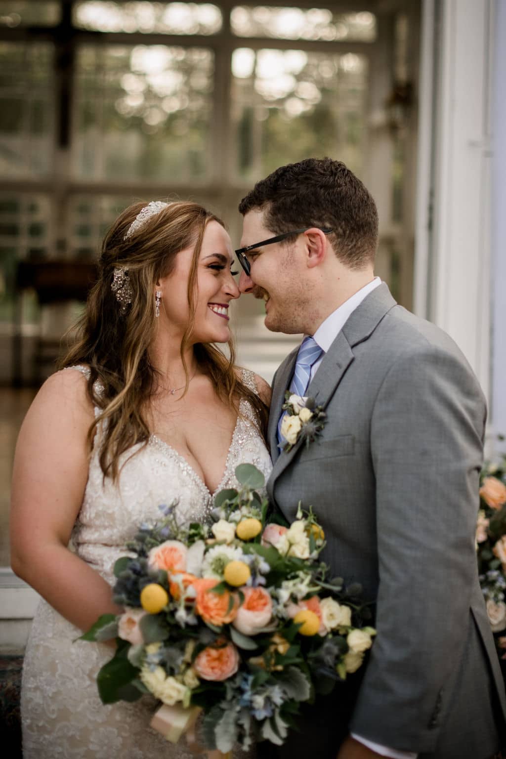 the texas bride and groom are facing each other