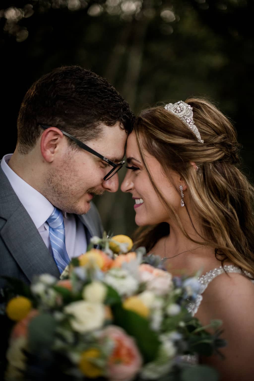 the texas bride and groom stare into each other's eyes and smile