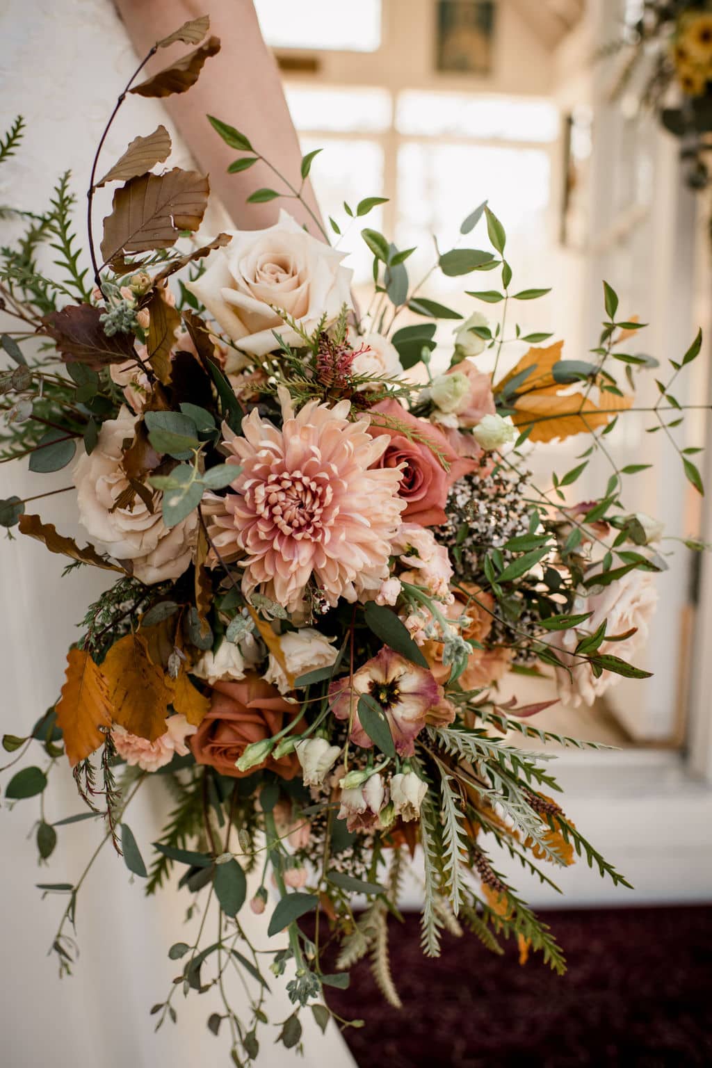 in learning how to plan a wedding in bryan college station, the bride opted for a bouquet of mixed flowers