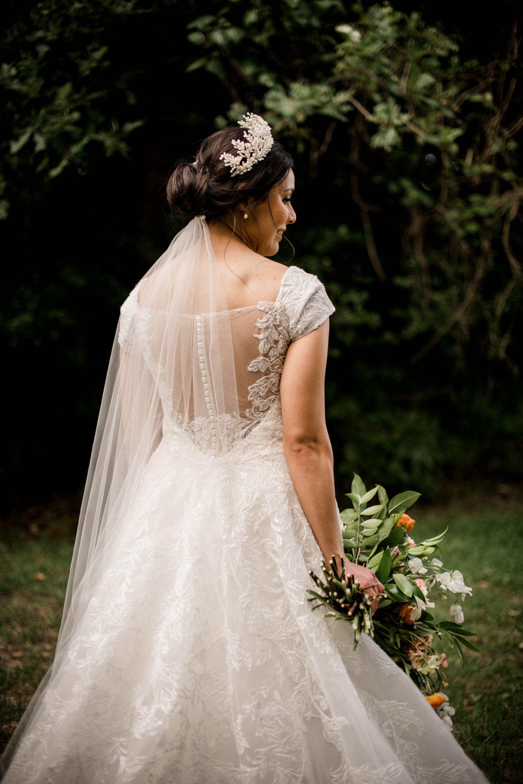 the texas bride is under the sun holding her bridal bouquet