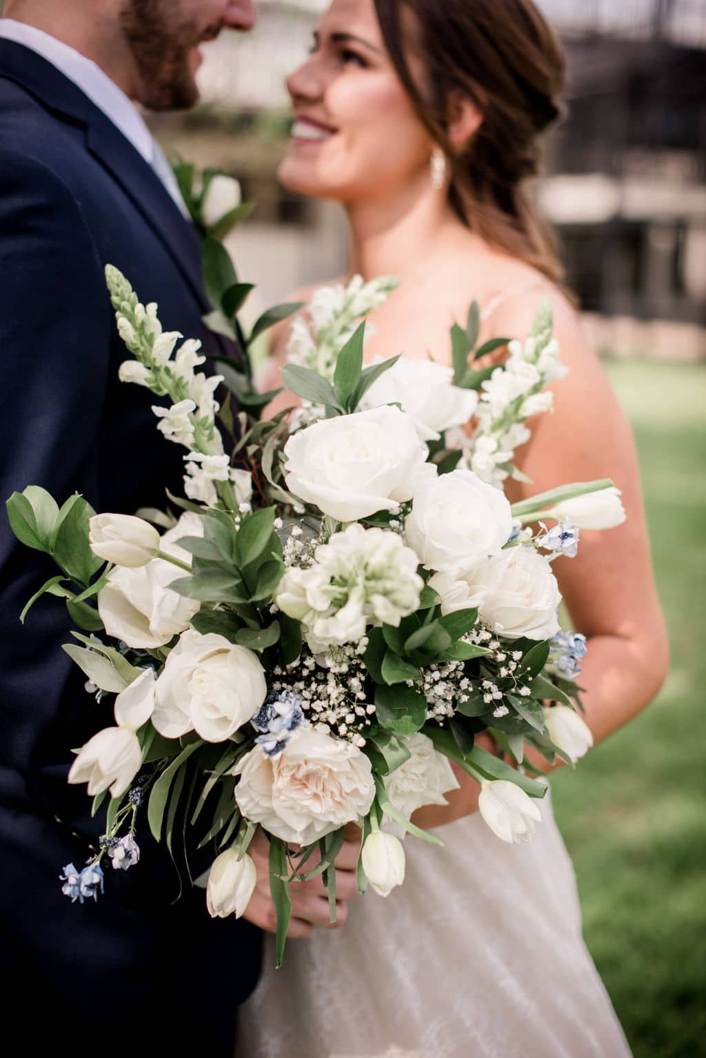 in learning how to plan a wedding in bryan college texas, the bride and groom opted for a bouquet of white mixed flowers