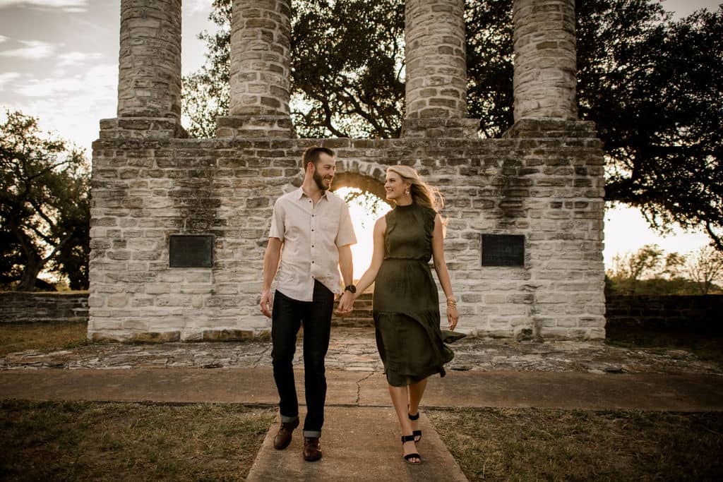 the future bride and groom are in texas in their engagement photo outfits