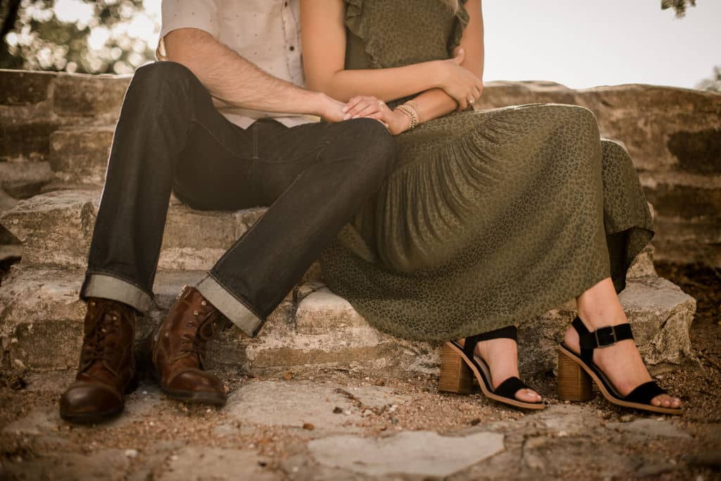 the future texas bride and groom are posed in their engagement photo outfits